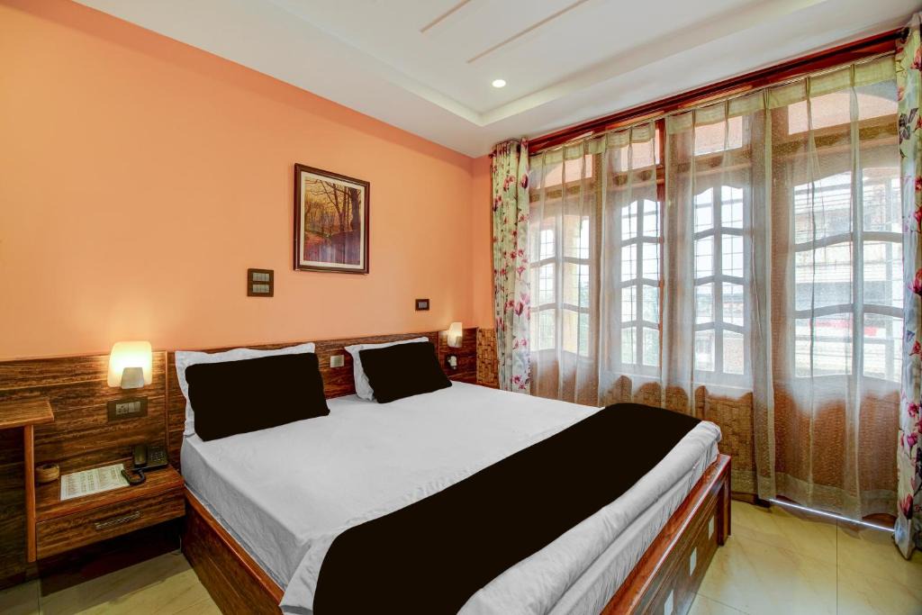 Sualkuchi Hotel | Collection O Downtown Hospital Guwahati Formerly Cherry City Cottage