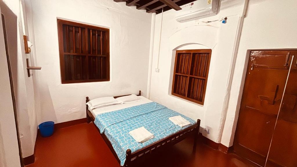 Kozhikode House | Idanazhi the corridor rooms AC