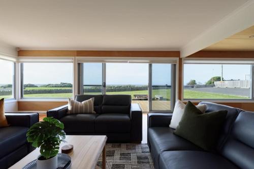 East Devonport House | Oceanfront Escape with Fire Pit & Coastal Views