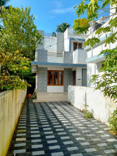 North Paravur House | Peaceful Vacation Home Near the City