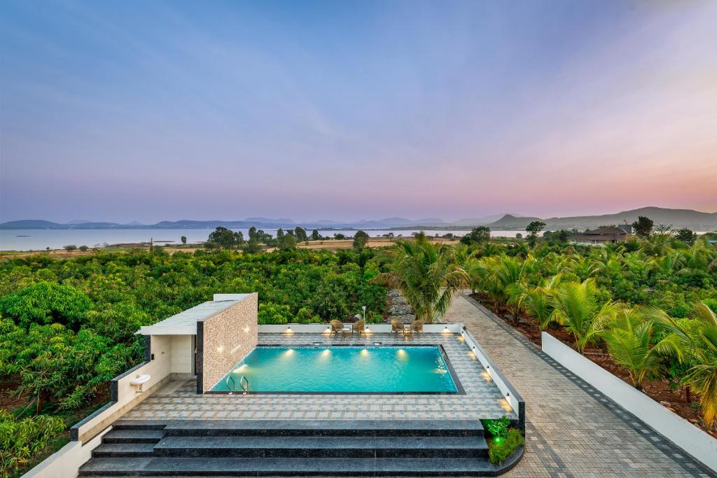 Nashik Villa | SaffronStays Mango Lakeview Villa, Nashik