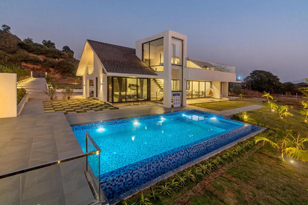 Khalapur Villa | SaffronStays Stargazer, Karjat - luxury pool villa with lake view