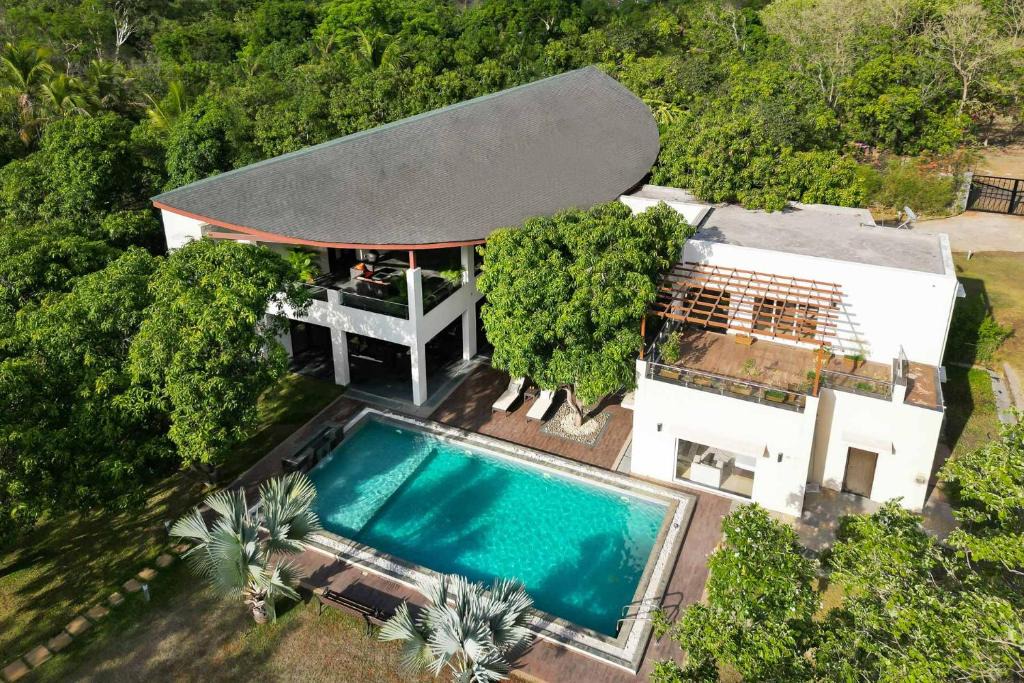 Alibaug Villa | The Leaf by StayVista - An enchanting escape offering a pool, terrace, lush lawn, contemporary interiors, and indoor games