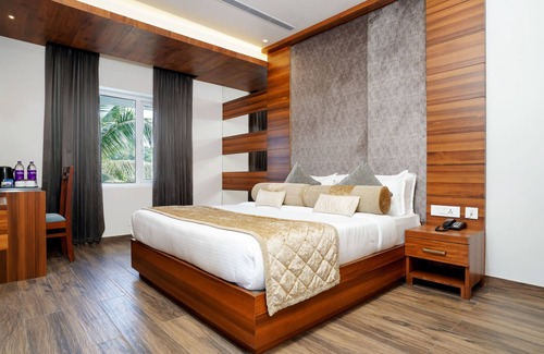Azhinjilam Hotel | Nexstay Rivermouth International