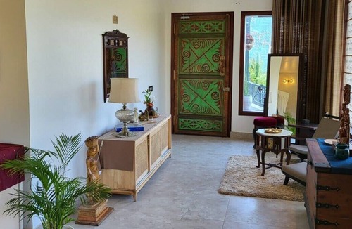 Bullawala Villa | 1B-BLUEDOOR-DEHRADUN · An artful one bedroom family suite at The Bluedoor