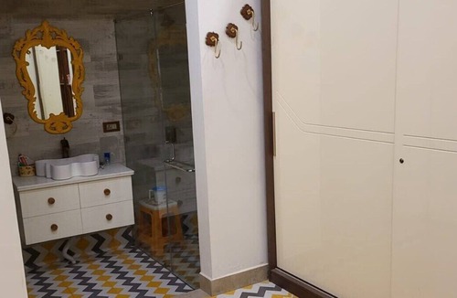 Bullawala Villa | 1B-BLUEDOOR-DEHRADUN · An artful one bedroom family suite at The Bluedoor