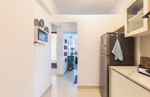 Siolim Condo | Bela Vista - 2BHK Balcony View Over Fields + Pool