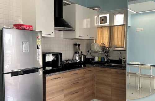 Siolim Apartment | BlueCouch- 1BHK w/pool & Sunset View Nr Vagator
