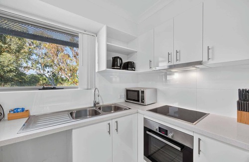 Rockingham Apartment | Bright 2BR Apartment with Garden Views
