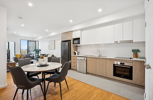 Cannington Apartment | Cannington Comfort – Beside Carousel & Curtin, featuring modern design and rooftop amenities.