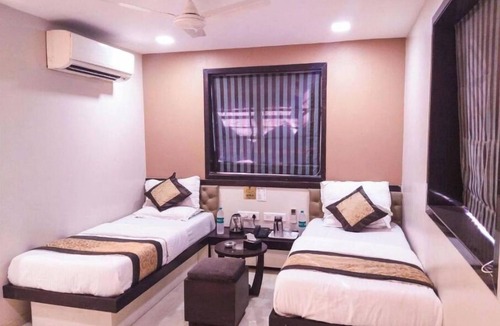 Wellington Pier Hotel | Colaba Suites - Near Taj Hotel