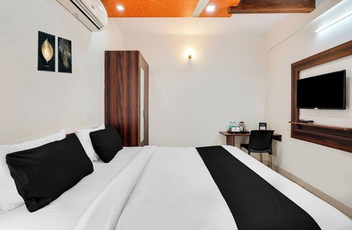 Domlur Hotel | Collection O Bangalore Airport Road
