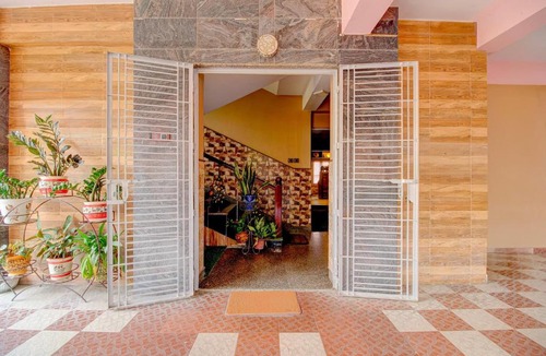 Sualkuchi Hotel | Collection O Downtown Hospital Guwahati Formerly Cherry City Cottage