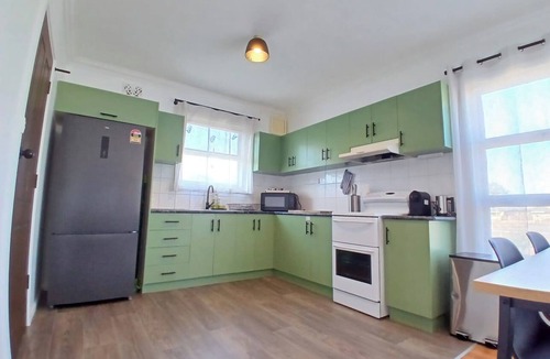 Whyalla Stuart House | Cozy industrial home with hot tub & fruit garden