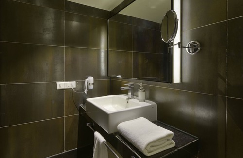 Koramangala Hotel | Davanam Sarovar Portico Suites Bengaluru