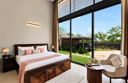Rajawas Villa | ELIVAAS Signature 24 Carat 4-BHK Villa with Private Outdoor Pool, Cabana, Garden, Gazebo & Open-Air Dining