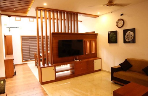 Chengannur Villa | Ethereal Retreatn4-bedroom villa in delightful Chengannur with WiFi, AC