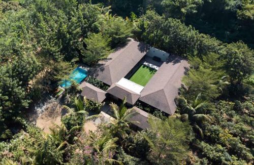 Nashik Villa | Farmhouse Retreat by StayVista - Classic architecture, Rustic interiors, Cozy rooms & A refreshing swimming pool