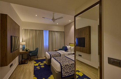 Vyalikaval HBCS Layout Hotel | Grand Continent Hebbal a Sarovar Portico Affiliate Hotel