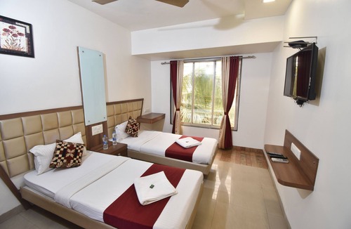 Kamothe Hotel | Hotel Candor Amigo