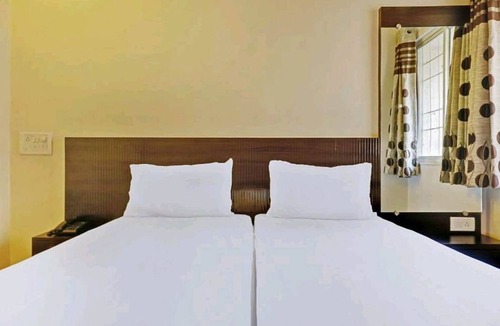 Central Pune Hotel | Hotel Rose Lodge