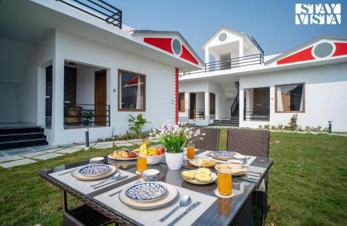 Dhela Villa | Hriday Bhoomi with Pool at Jim Corbett by StayVista