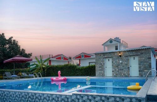 Dhela Villa | Hriday Bhoomi with Pool at Jim Corbett by StayVista
