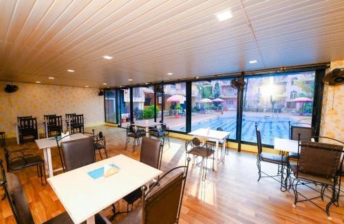 Arpora Hotel | Joystays Renton Manor