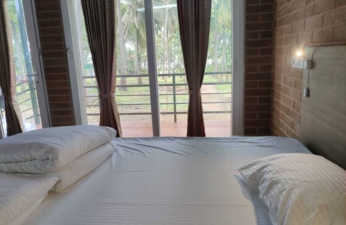 Heggadadevankote Resort | Lake side retreat with earthen cottages