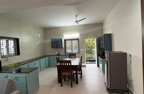 Tirupati Apartment | Luxe 2 BHK Flat with a vast living room, wifi and Air conditioning in Tirupati.