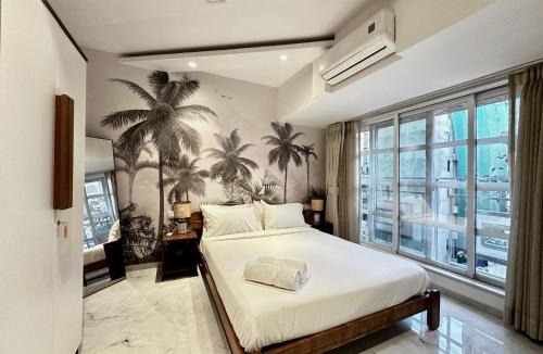 Khar Apartment | Luxury 2 BHK Tropical Apartment with Workspace in Khar West