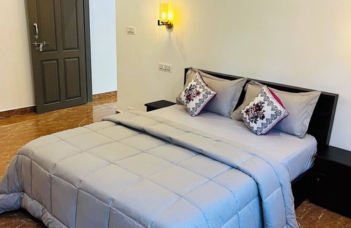 Thariyode House | Marvelous 2-bedroom bungalow, tranquility at our dam-facing Banasura Sagar Dam.