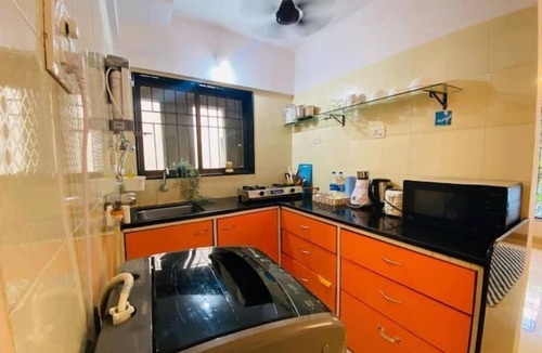Girgaon Apartment | Nature Inspired Sun Drenched 1BR in Bandra