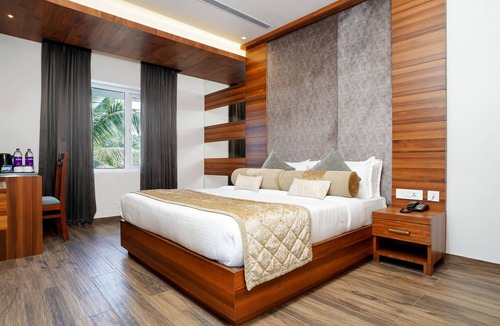 Azhinjilam Hotel | Nexstay Rivermouth International