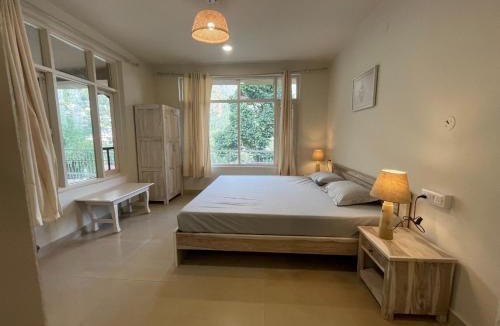 Dharamkot House | NomadGao Dharamkot - A social hotel with Coworking, fast Wifi, peaceful rooms, and great views - Close to Mcleodganj