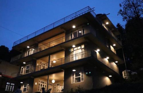 Dharamkot House | NomadGao Dharamkot - A social hotel with Coworking, fast Wifi, peaceful rooms, and great views - Close to Mcleodganj