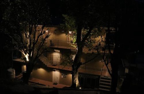 Dharamkot House | NomadGao Dharamkot - A social hotel with Coworking, fast Wifi, peaceful rooms, and great views - Close to Mcleodganj
