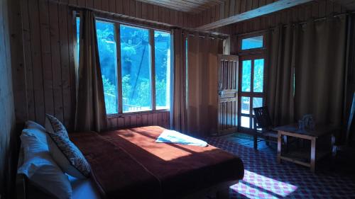Banjar House | Ojhal Stays