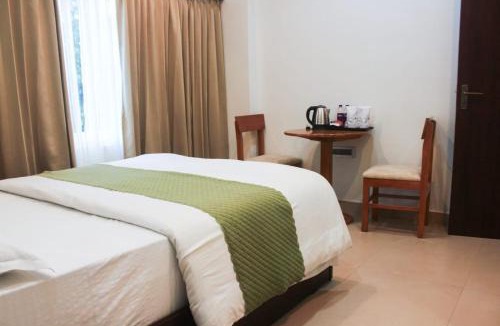 Alipurduar Hotel | Peridott Inn