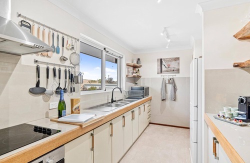Halls Head Villa | PRIME BEACHFRONT. PRIME VIEWS. PRIME TIME. Elegance, with mobility elevator.