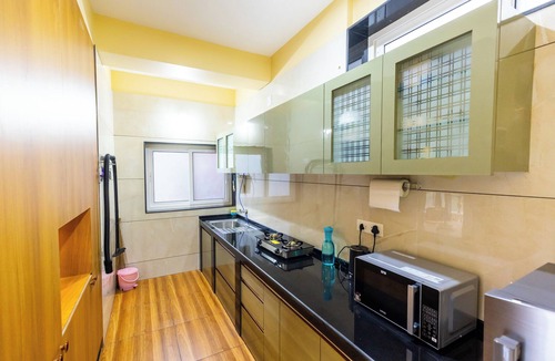 Tonse West Apartment | Riverside Retreat HomeStay – AC Studio with Breakfast Option & Boat Ride