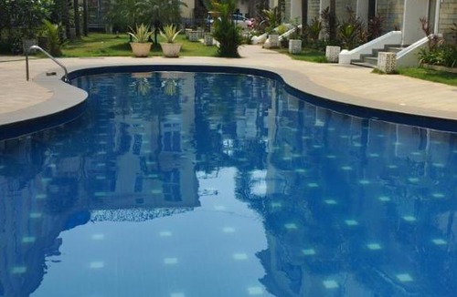 Arpora Apartment | Royal Pool View Apartment by Leela Homes