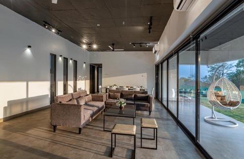 Khalapur Villa | SaffronStays Stargazer, Karjat - luxury pool villa with lake view