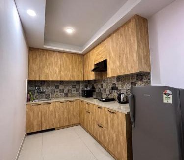 Gurugram Apartment | Sandstone Room