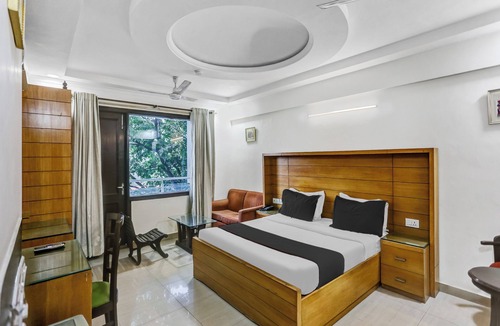 East of Kailash Hotel | Signature Plaza By MERRIMENT
