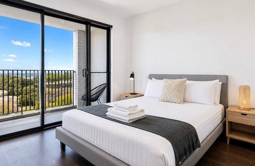 Lidcombe Apartment | Spacious Pool Retreat with Gym Pool BBQ Rooftop