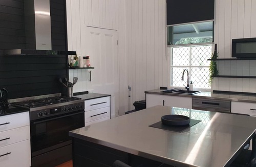 Gin Gin House | Station Masters Queenslander Country Home. Heritage charm meets modern luxury!