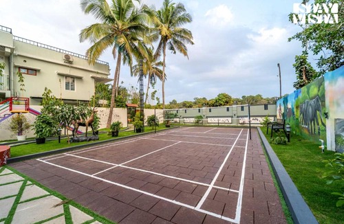 Mananthavady Villa | StayVista at Lagoons Kuruva with Shared Pool, Lawn