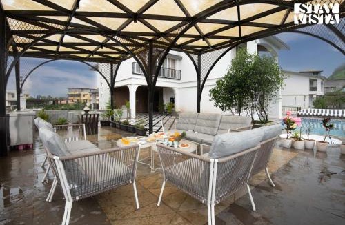 Kurvande Villa | StayVista at Solace Land with Bonfire, Jacuzzi