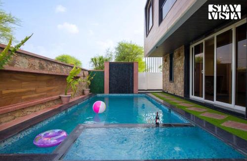 Amer Villa | StayVista at Talin Farms with Mountain View, Pool